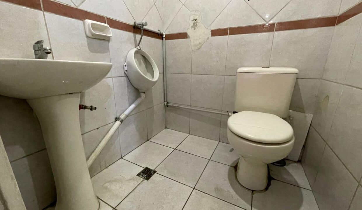 baño compartido